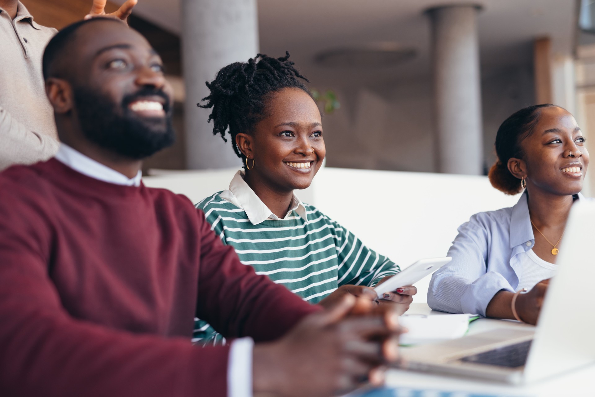 Young african professionals attending a meeting in the office